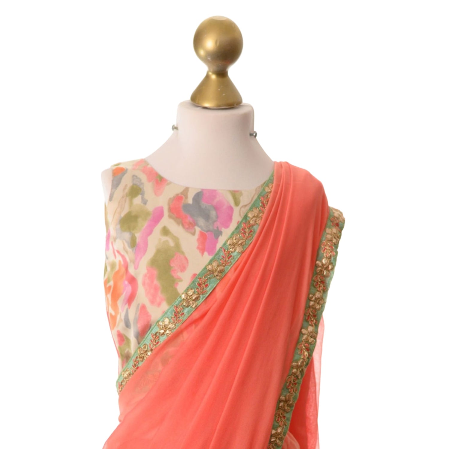 Close up of Area saree showing front pleats and blouse.